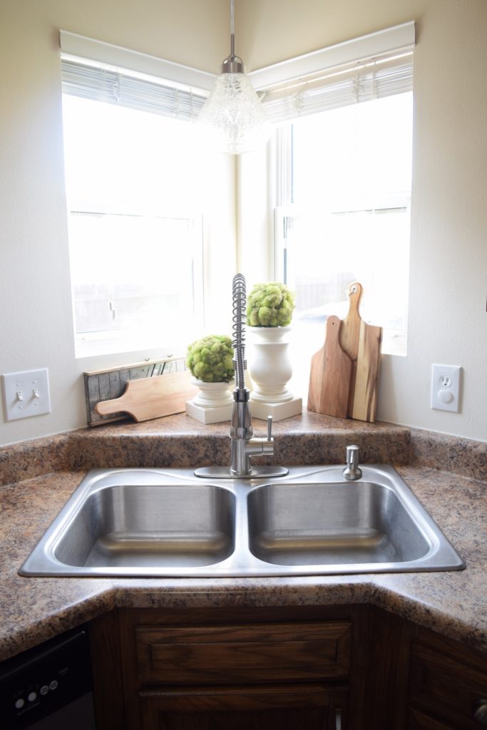 Change the Faucet to Remodel Your Kitchen On A Tight Budget