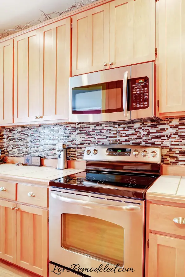 Updating Wood Kitchen Cabinets Love, Kitchen Backsplash Ideas With Dark Oak Cabinets And Doors