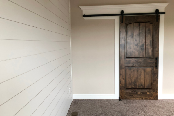 shiplap walls make a room look longer