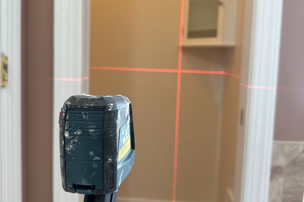 Using a Laser Level to Apply Peel and stick wallpaper