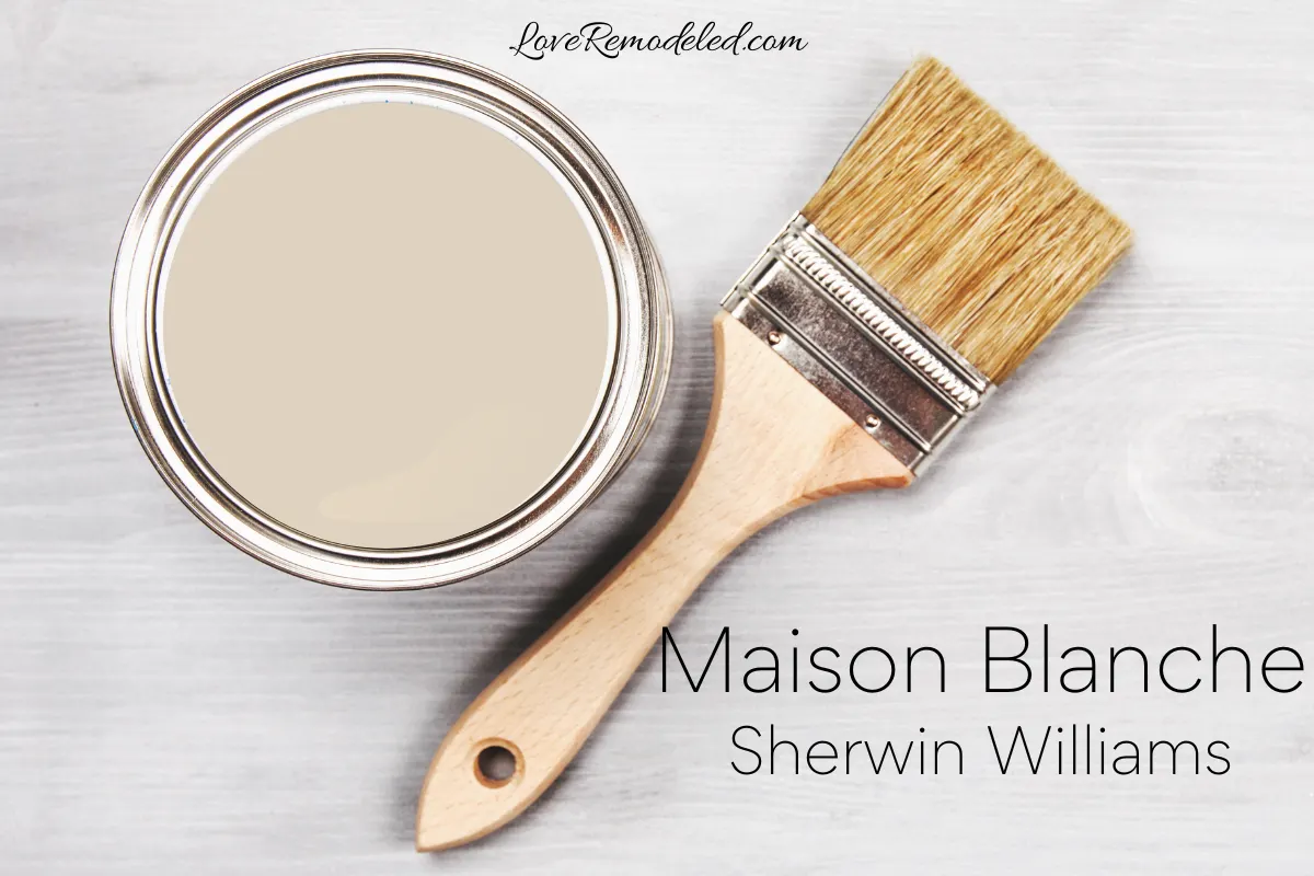 Maison Blanche by Sherwin Williams in paint can with a paintbrush alongside it