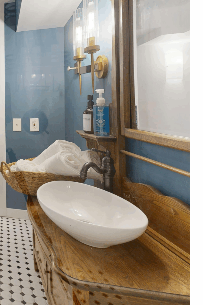 French Blue Paint Colors - blue walls in bathroom with wood vanity