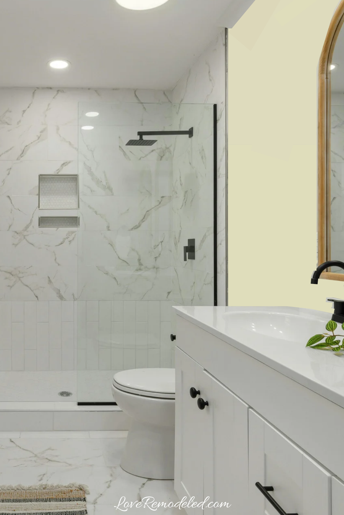 Sherwin Williams Celery on walls in cool toned marble bathroom